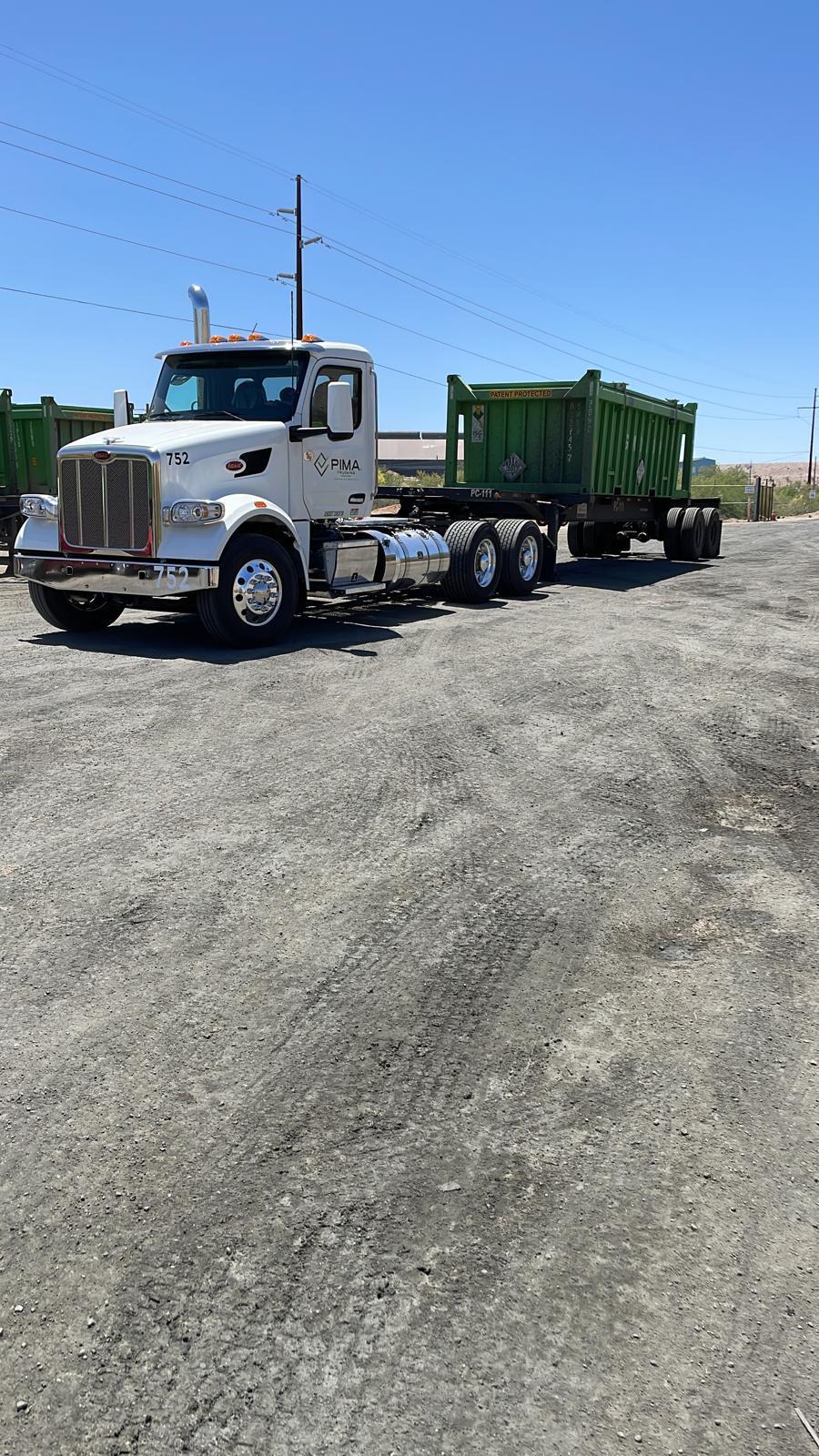 PIMA TRUCKING Peterbilt unit 752 with tolva trailer